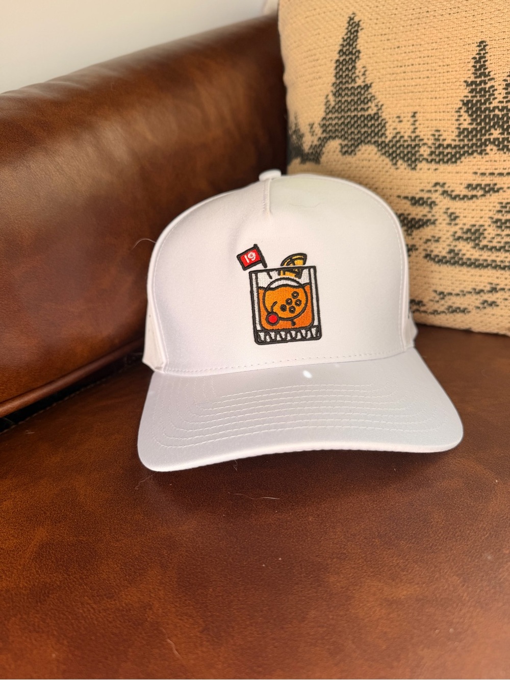White Men’s Baseball Cap with Embroidered Drink Patch